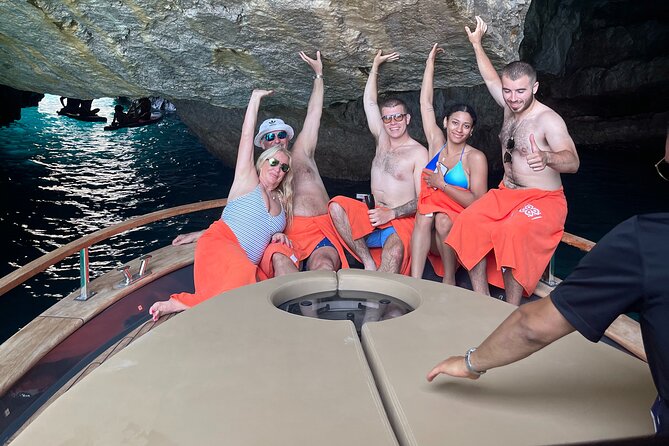 All-Inclusive Capri Boat Tour with City Visit from Positano - The caves, coves, and cliffside sights