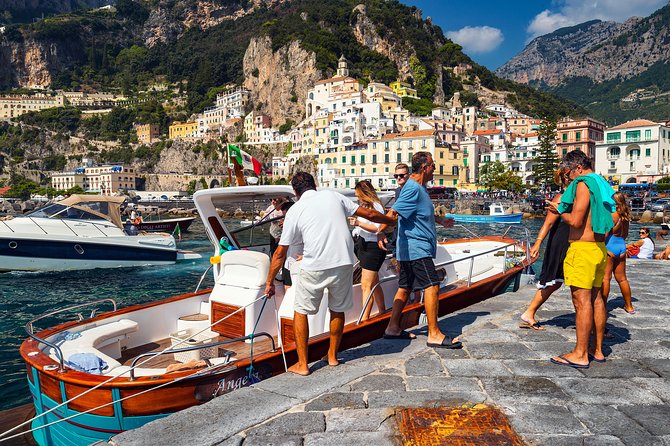Amalfi Coast Boat Tour from Sorrento with Positano Visit - Amalfi: time to eat, shop, and wander