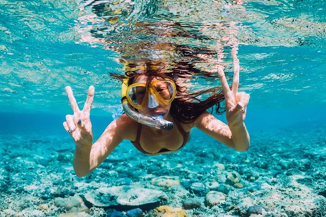 Amalfi Coast & Positano: Boat Tour with Snorkeling & Drinks - Positano’s houses, beaches, and a quieter cove