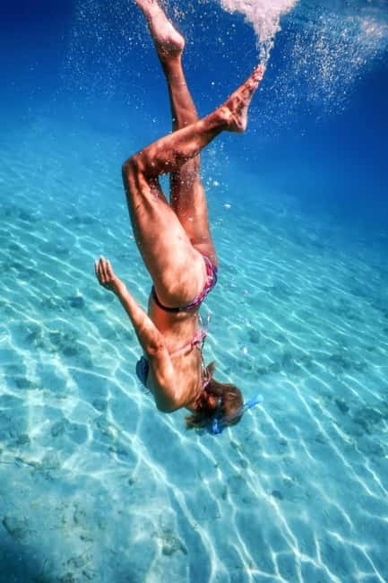 Amalfi Coast Shared Sunset Cruise: Swim, Drinks & Views - Positano at golden hour