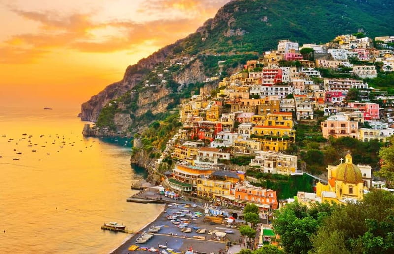 Amalfi: Sunset Boat Tour with Fruit and Drinks - Amalfi’s grottoes and the Arc of Lovers