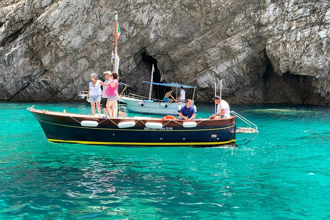 Boat Tour in Capri Italy - From pale caves to the Faraglioni