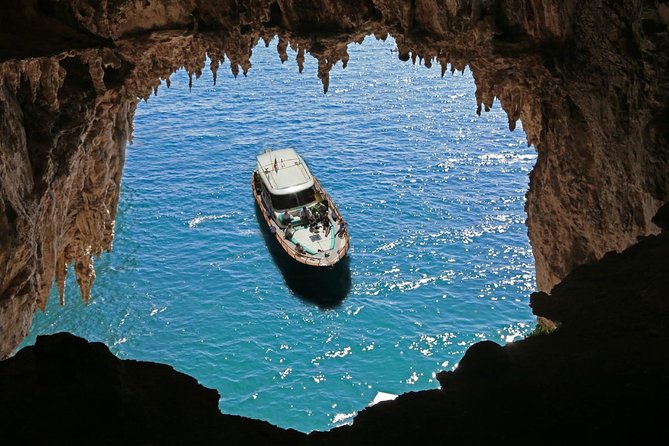 Capri Boat Tour from Sorrento: Swim, Grottos & Light Lunch - A small boat makes Capri feel closer