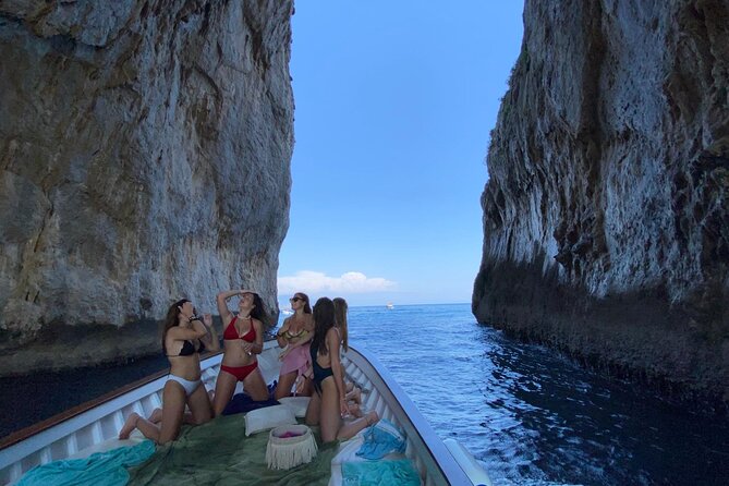 Capri Boat Tour: Grottoes, Swim & Sip Limoncello in a Small Group - The grottoes: dramatic openings, not the Blue Grotto