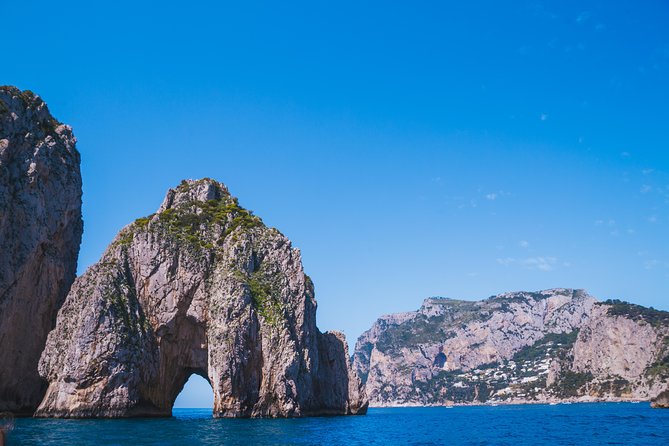 Capri Boat Tour: Grottoes, Swim & Sip Limoncello in a Small Group - Meeting at Marina Grande
