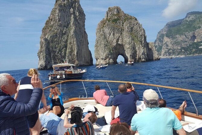 Capri Deluxe/First to Blue Grotto/from Sorrento Positano & Amalfi - Grottos and the Faraglioni from the boat