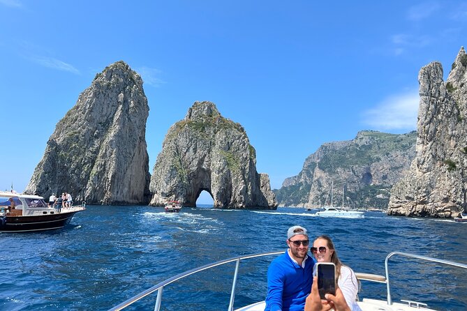 Capri in a Day All Inclusive Premium Boat Tour + City Visit - Swimming, snacks, and the onboard atmosphere