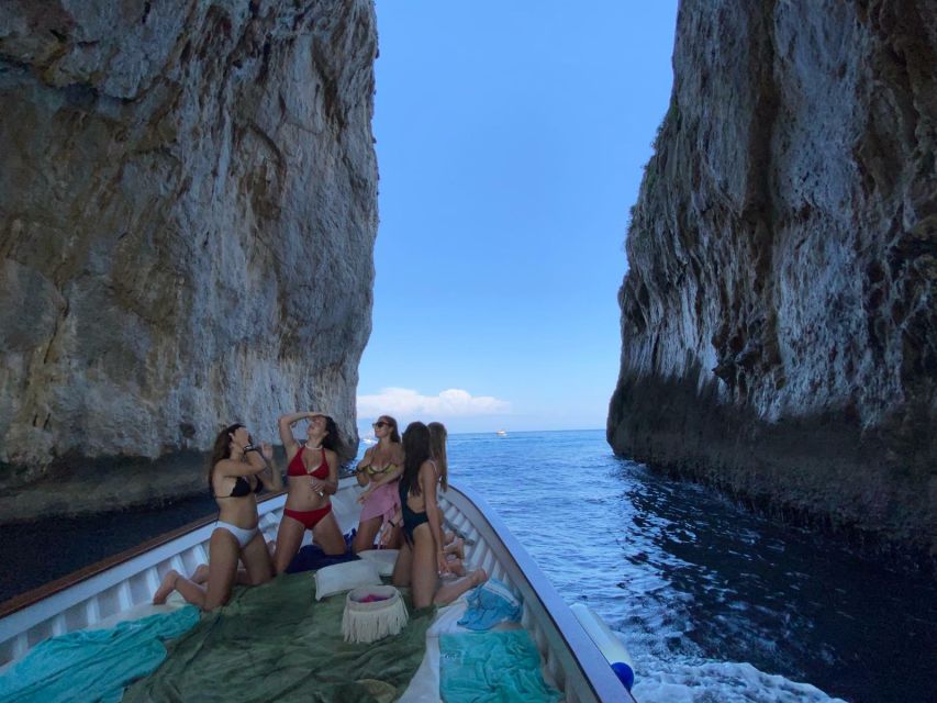 Capri: Island and Grottos Boat Cruise with Snacks and Drinks - The swim stop and what to bring