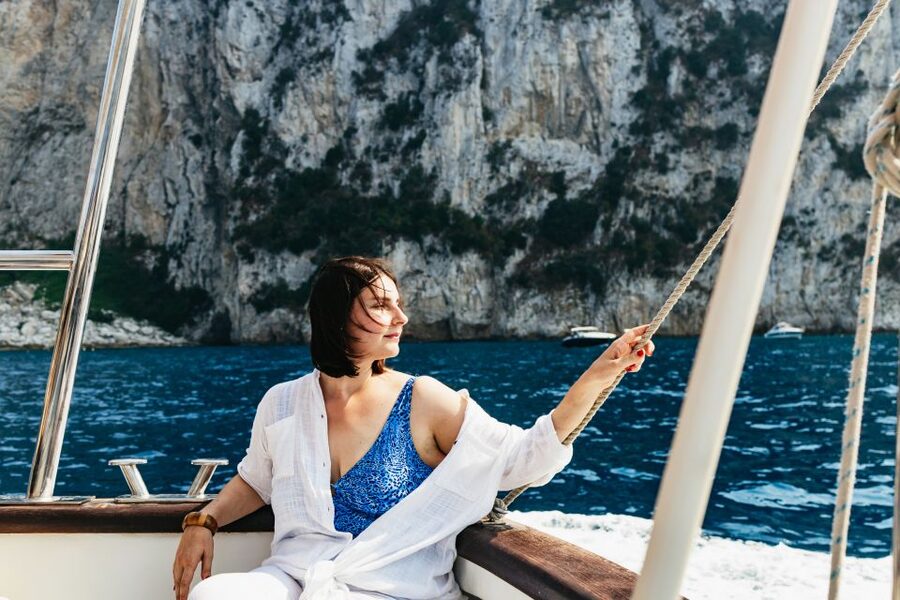 Capri: Island Boat Trip with Grottos - Casa Malaparte and the cliffs beyond