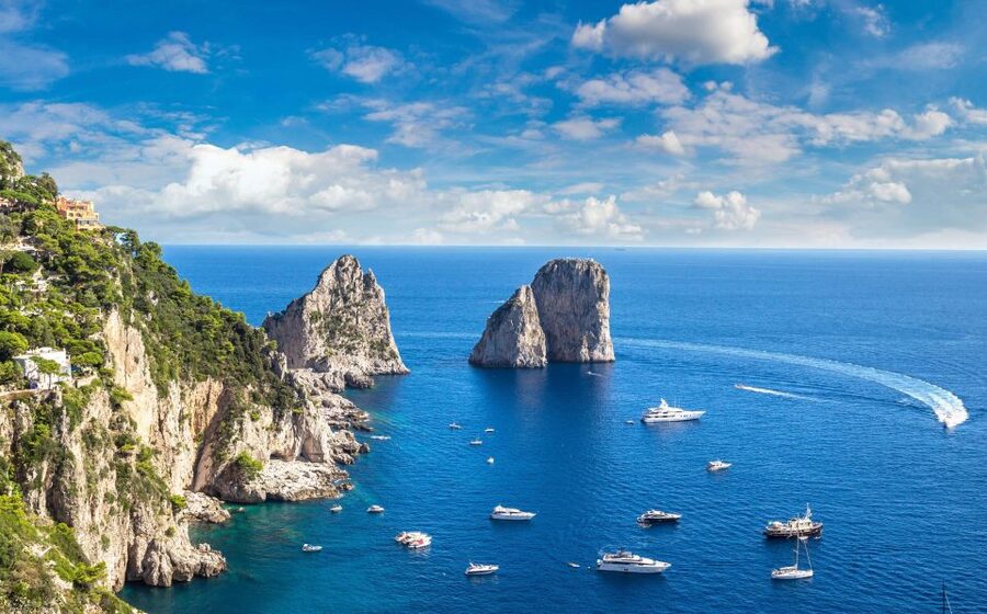 From Amalfi: Capri Island Boat Tour with Snorkeling & Drinks - Capri from the water: Faraglioni and grottoes