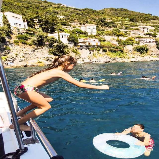 From Amalfi: Coast & Furore Fjord Boat Tour with Swim Break - The swim stop: a cool pause, not a beach visit