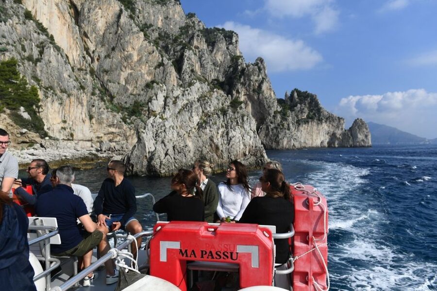 From Sorrento: Day Trip to Capri with Blue Grotto - Capri from the water: caves, cliffs, and the Faraglioni