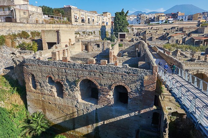 Guided Day Tour of Pompeii and Herculaneum with Light Lunch - Pompeii: streets, monuments and the Villa of Mysteries