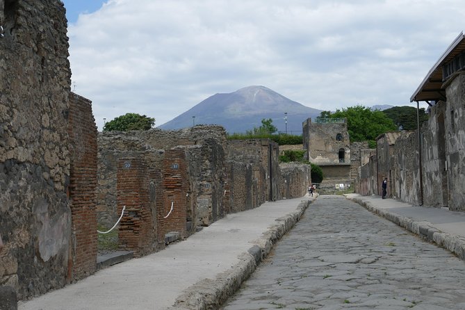 Guided Day Tour of Pompeii and Herculaneum with Light Lunch - Pack for stone paths and a hot afternoon