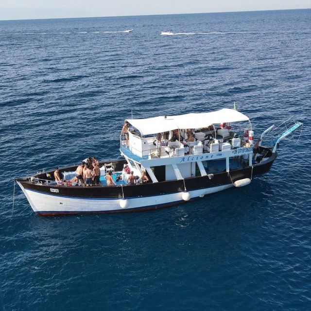 Ischia: Island Boat Tour with Neapolitan Lunch & Snorkeling - A sea-level view of Ischia