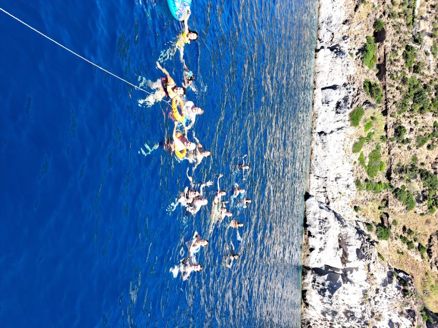 Ischia: Island Boat Tour with Neapolitan Lunch & Snorkeling - Scarrupata and the southern coast