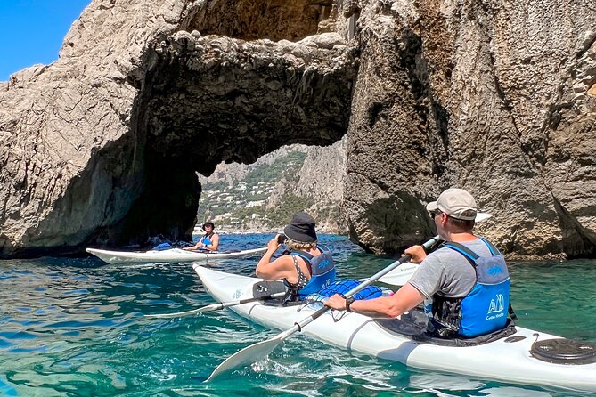 Kayak tour in Capri between caves and beaches. Photos included. - Paddling into the Grotta dell’Acqua and Green Grotto
