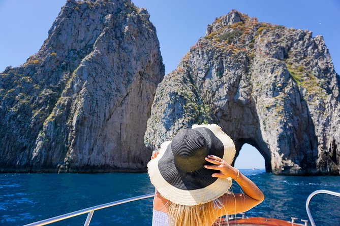 Small Group Boat Tour Capri & Blue Grotto with Swimming Stops - Grottoes, cliffs and the Faraglioni
