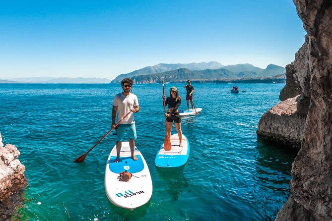 Small group paddle boarding tour to Bagni Regina Giovanna - From Marina Grande to Punta del Capo