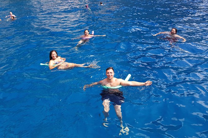 Sorrento: Capri Select Boat Trip with Swim, Drinks & Pick Up - Looking for dolphins, then the Blue Grotto